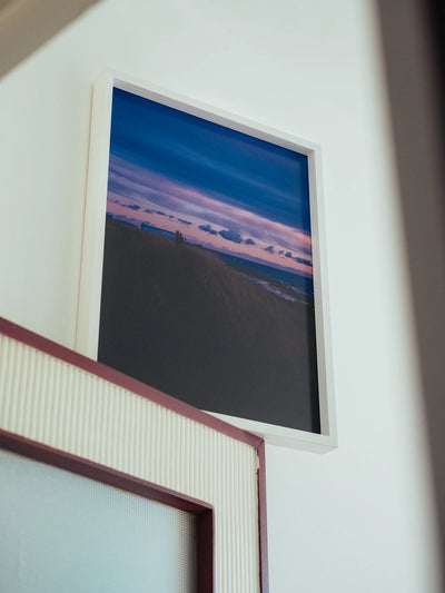 Fotografia paesaggio costiero framed print showing a dusk horizon over the sea